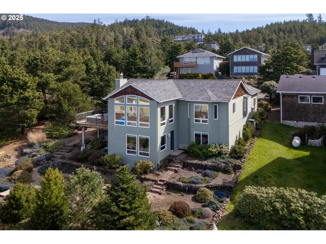 a backyard of a house with garden and patio