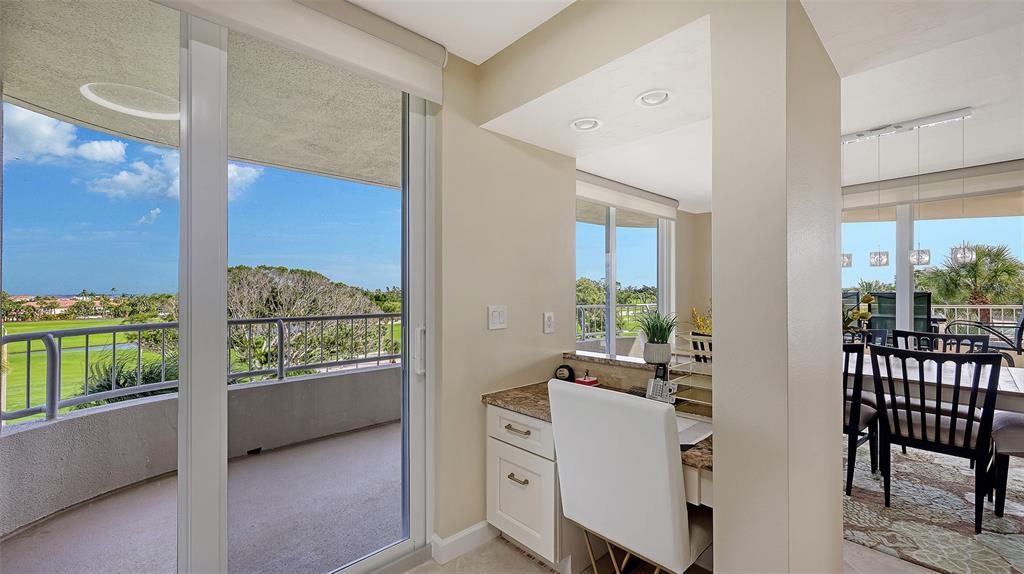 775 Longboat Club Road, Unit 304 Longboat Key, FL 34228 - Photo 12 of 52 a view of a living room and a balcony
