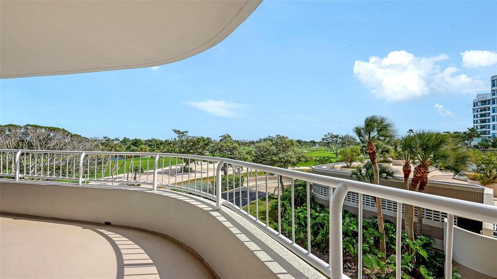 775 Longboat Club Road, Unit 304 Longboat Key, FL 34228 - Photo 22 of 52 a view of a city from a balcony