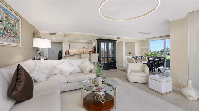 a living room with furniture and a rug