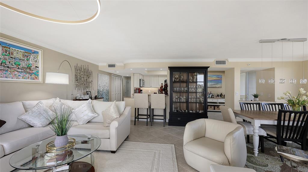 775 Longboat Club Road, Unit 304 Longboat Key, FL 34228 - Photo 25 of 52 a living room with furniture and a rug