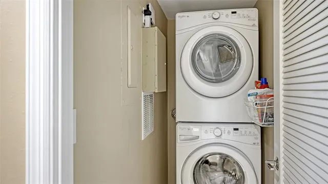 a view of swimming pool with outdoor seating and plants