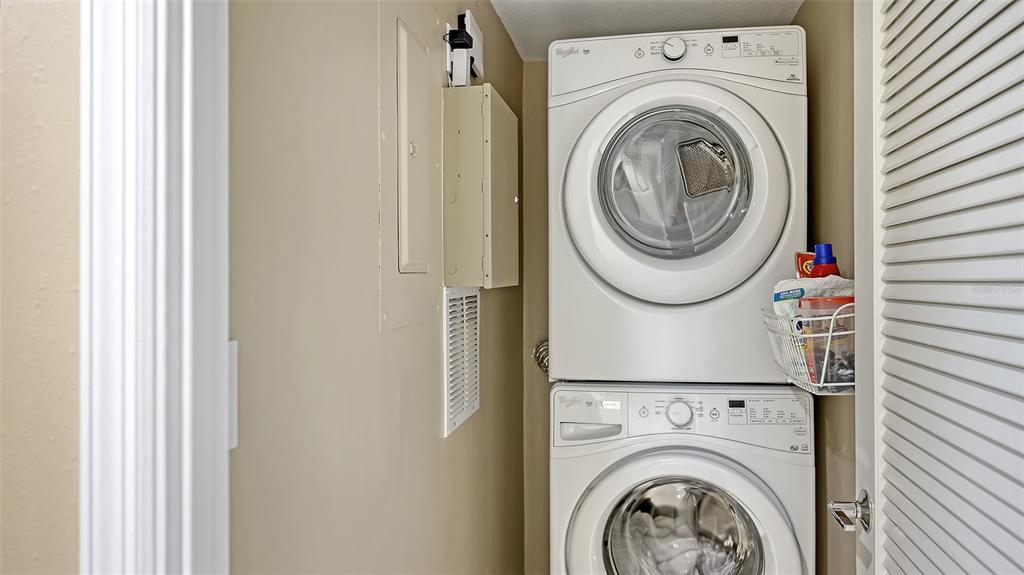 775 Longboat Club Road, Unit 304 Longboat Key, FL 34228 - Photo 35 of 52 a utility room with dryer and washer