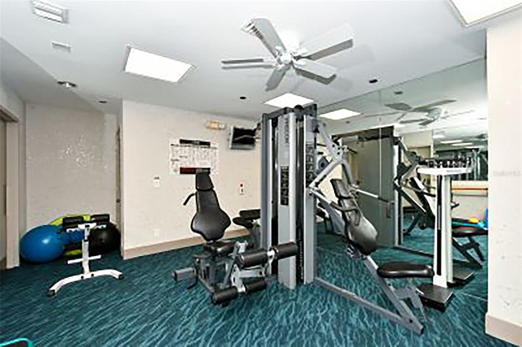 775 Longboat Club Road, Unit 304 Longboat Key, FL 34228 - Photo 49 of 52 a view of a room with gym equipment