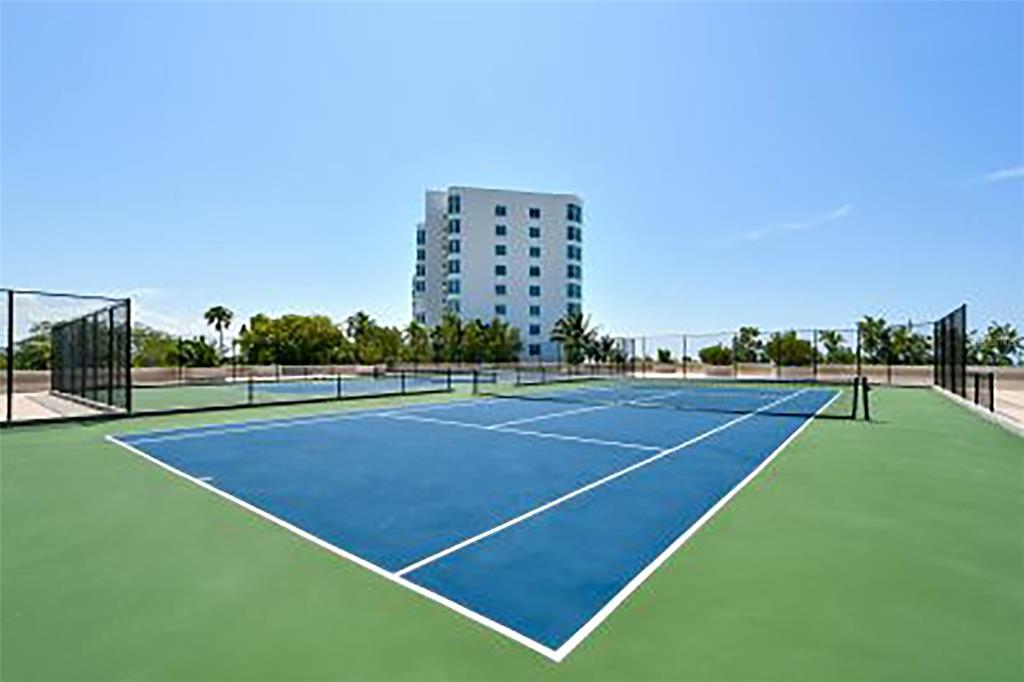 775 Longboat Club Road, Unit 304 Longboat Key, FL 34228 - Photo 51 of 52 a view of a tennis court