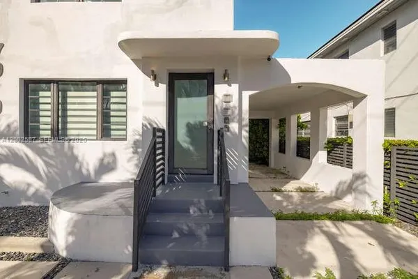 a front view of a house with patio