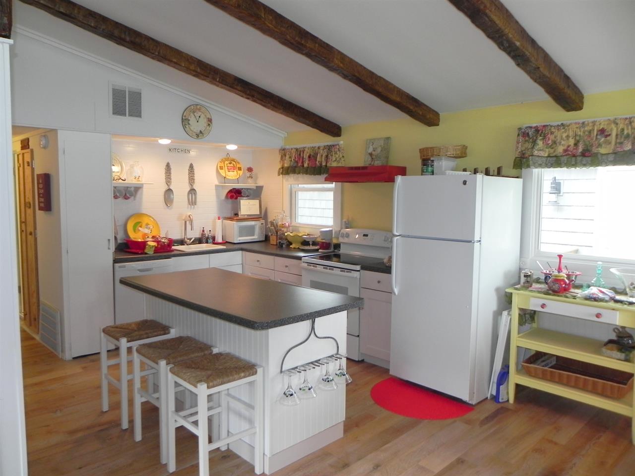 534 Baintree Road Lake Summerset, IL 61019 - Photo 18 of 25 a kitchen with stainless steel appliances granite countertop a refrigerator and a stove