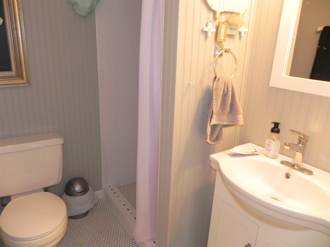 534 Baintree Road Lake Summerset, IL 61019 - Photo 20 of 25 a white toilet sitting next to a bathroom sink