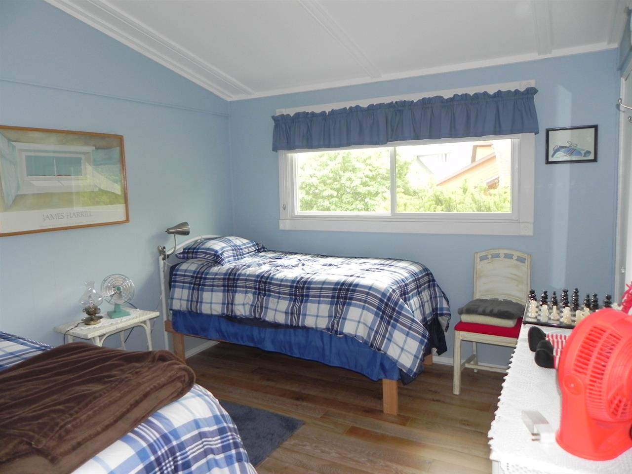 534 Baintree Road Lake Summerset, IL 61019 - Photo 23 of 25 a bedroom with a bed and a window