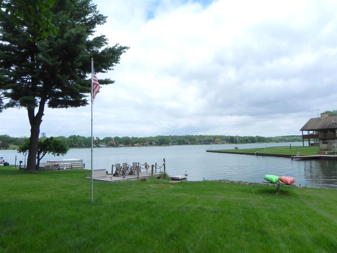 534 Baintree Road Lake Summerset, IL 61019 - Photo 8 of 25 a view of a lake with houses in the back