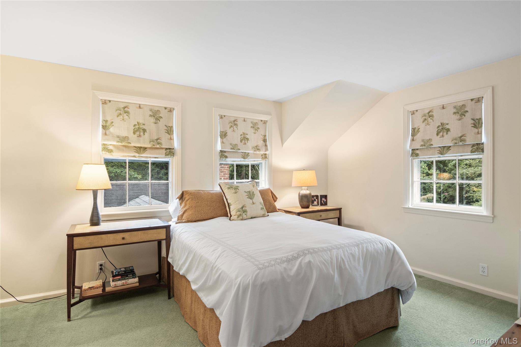 1276 Ridge Road Syosset, NY 11791 - Photo 20 of 30 a bedroom with a bed and a window