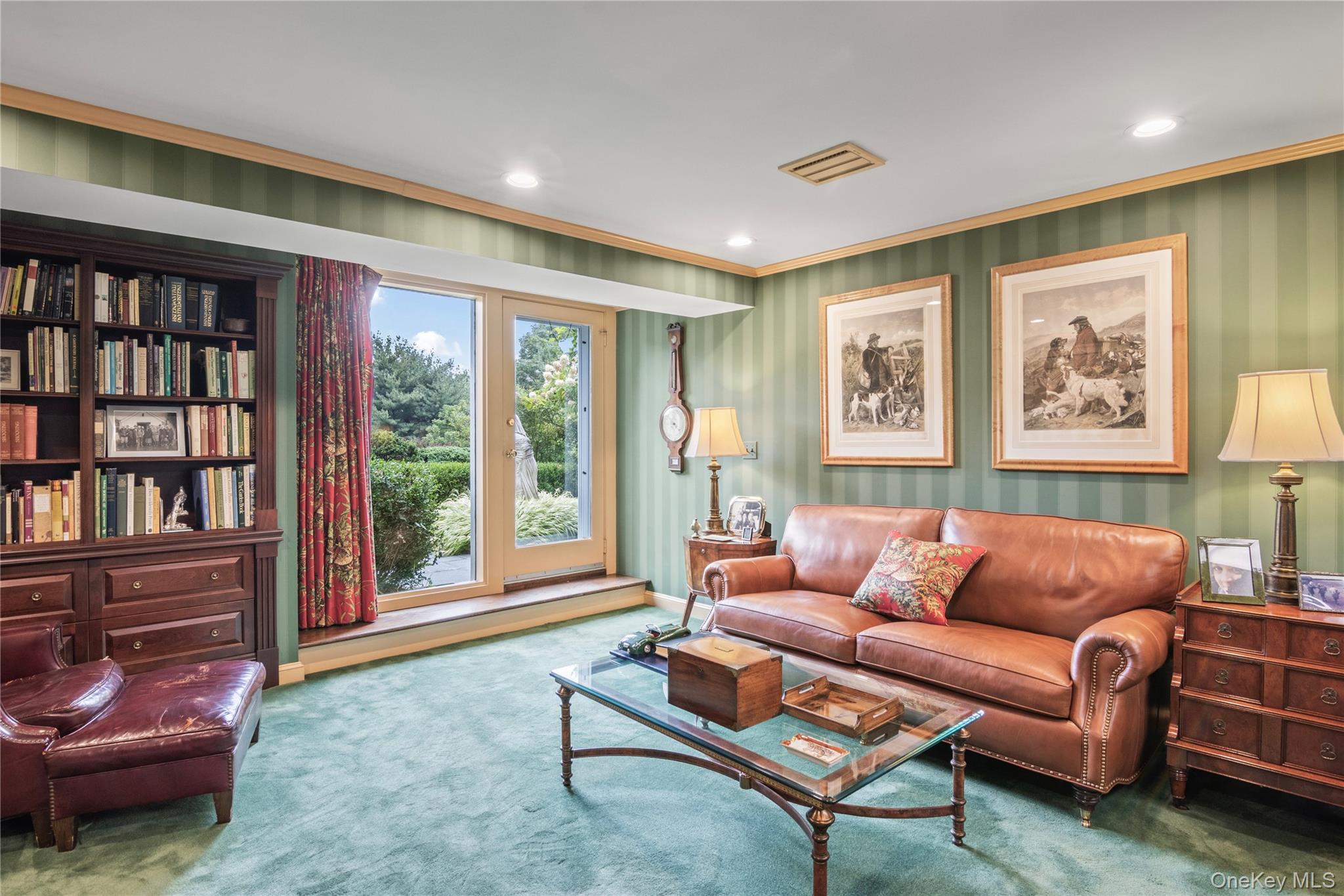 1276 Ridge Road Syosset, NY 11791 - Photo 23 of 30 a living room with furniture and a large window