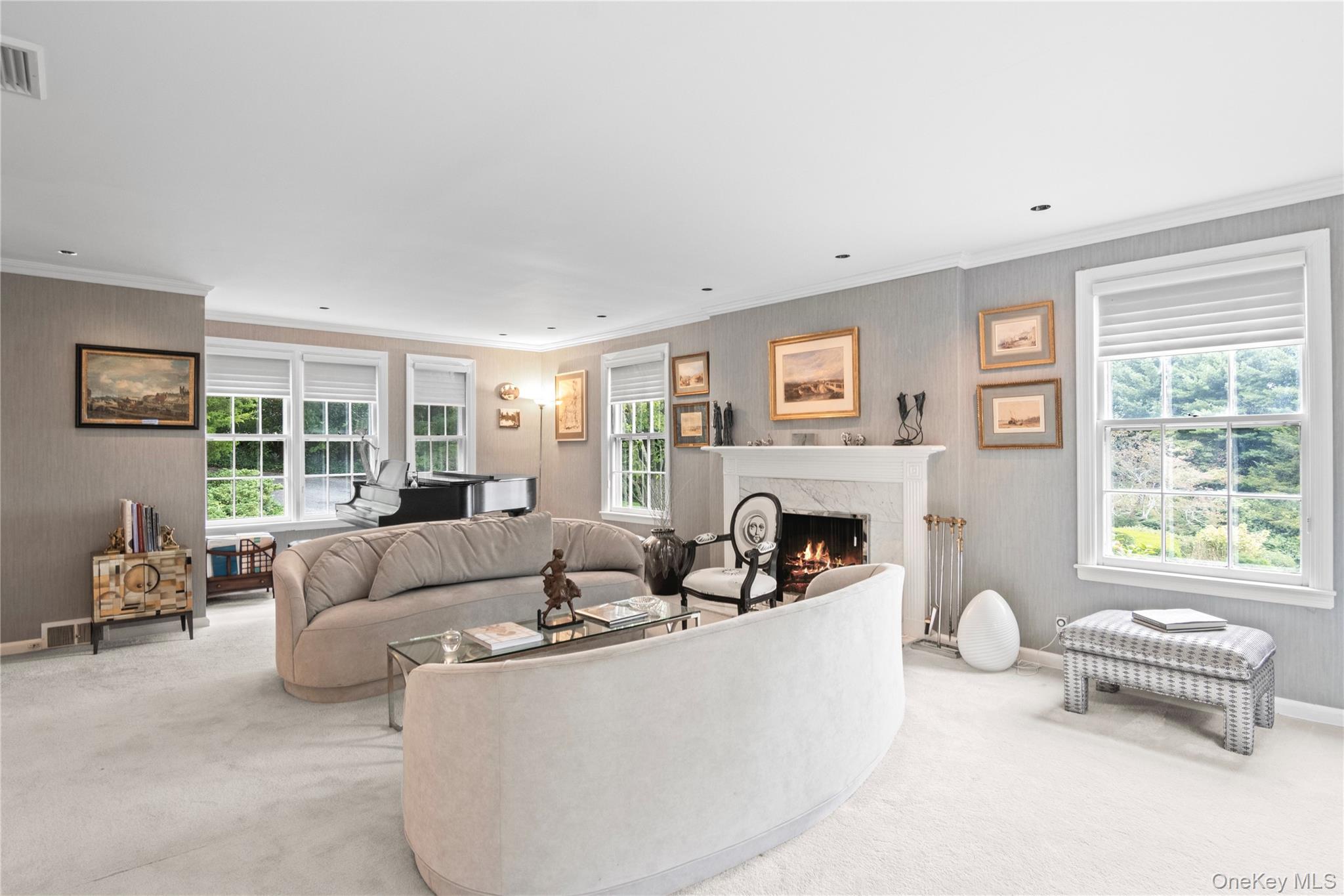 1276 Ridge Road Syosset, NY 11791 - Photo 7 of 30 a living room with furniture and a large window