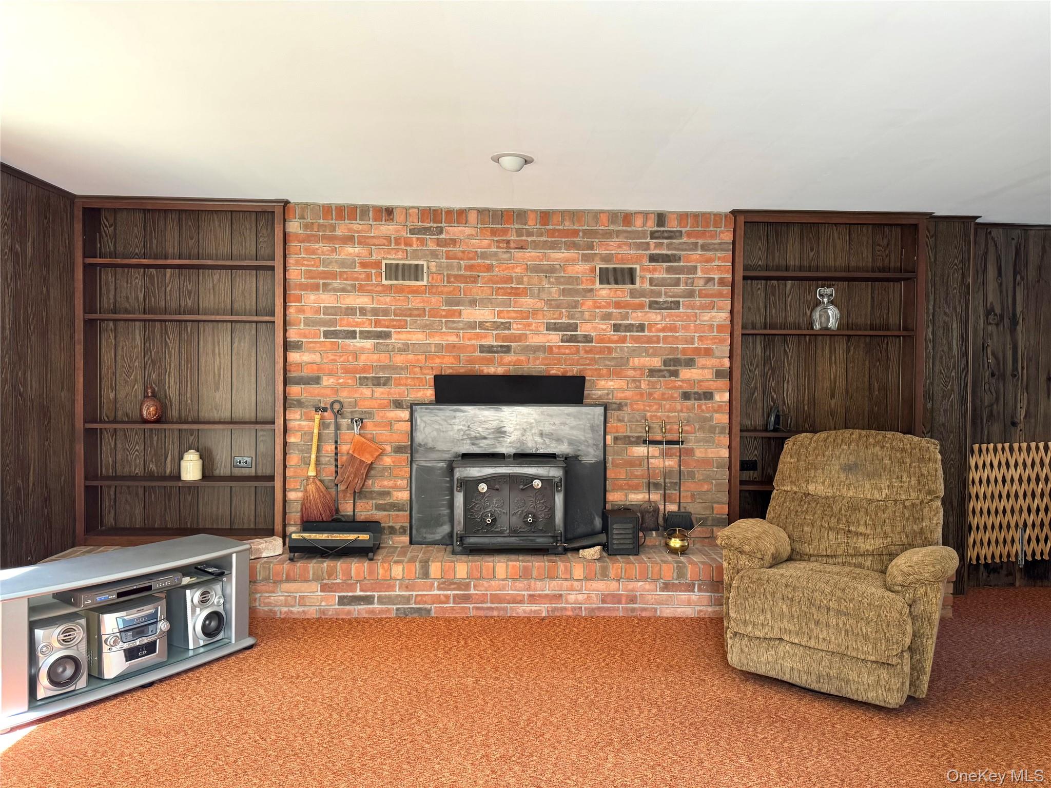 36 Jones Street Cairo, NY 12413 - Photo 12 of 32 a living room with furniture and a fireplace
