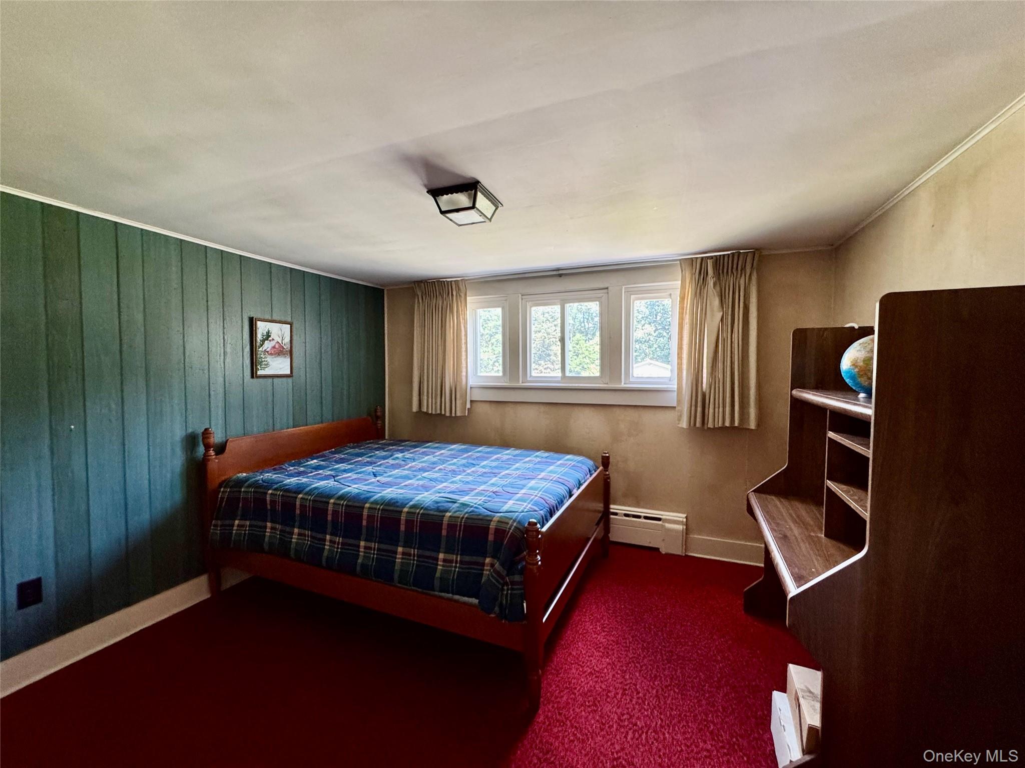 36 Jones Street Cairo, NY 12413 - Photo 24 of 32 a bedroom with a bed closet and windows