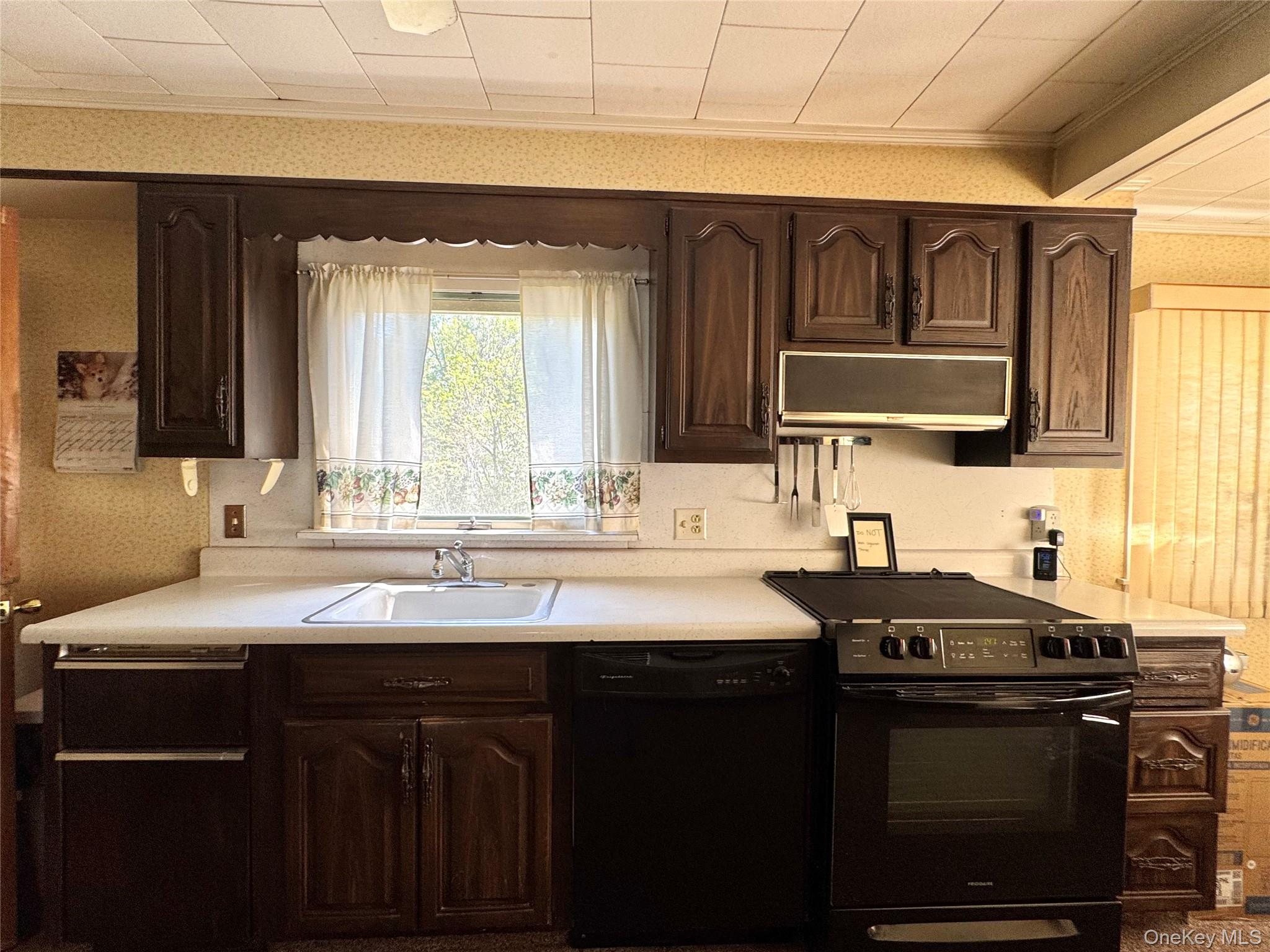 36 Jones Street Cairo, NY 12413 - Photo 6 of 32 a kitchen with a sink stove and cabinets