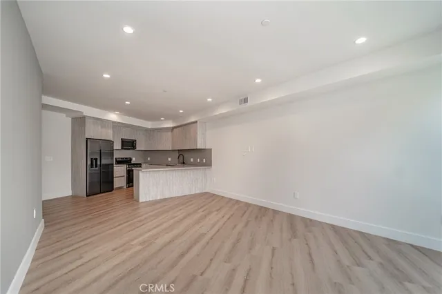 a view of kitchen kitchen microwave and cabinets