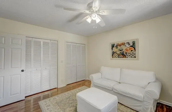 a living room with furniture and a rug