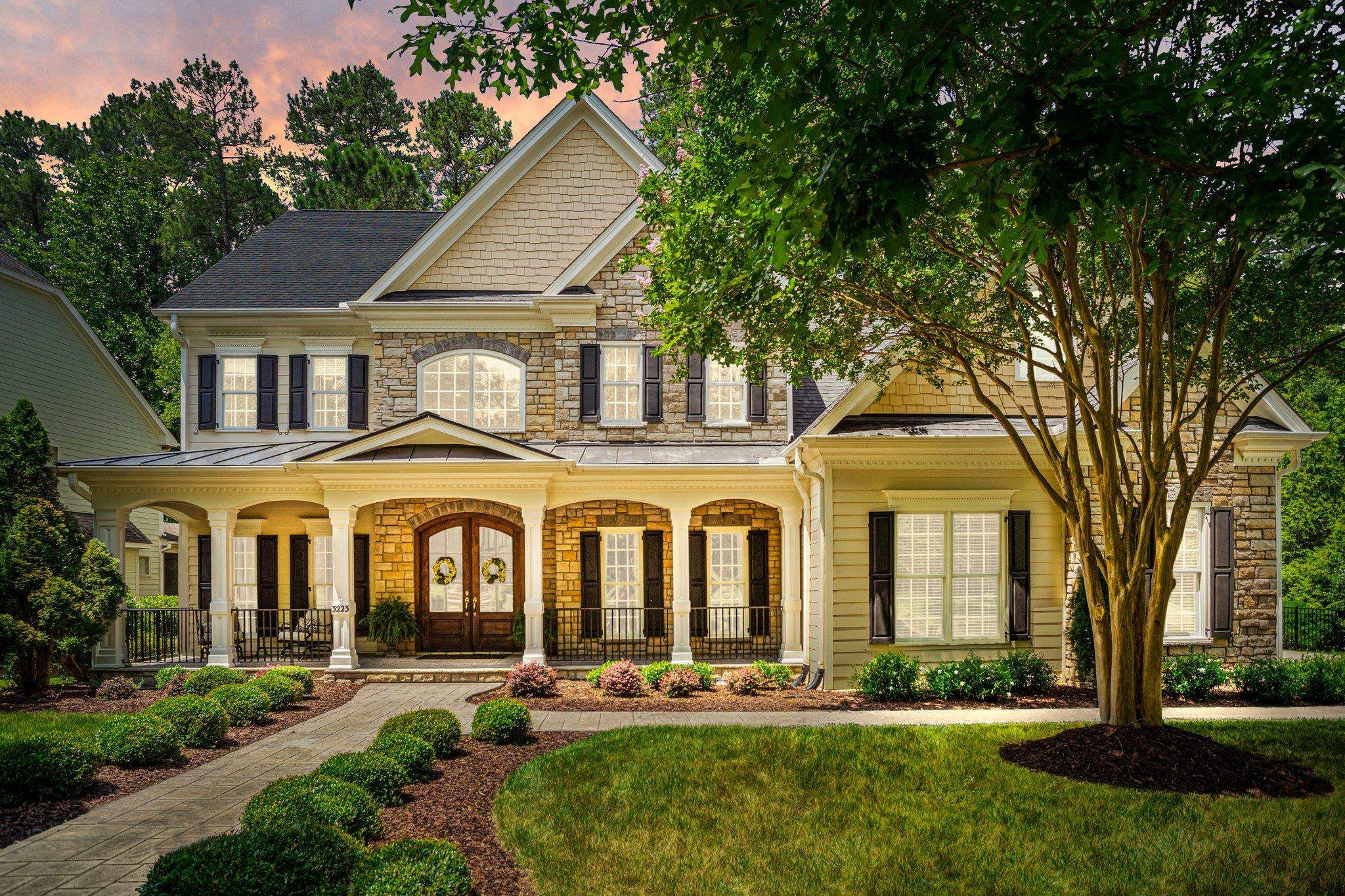 front view of a house with a yard