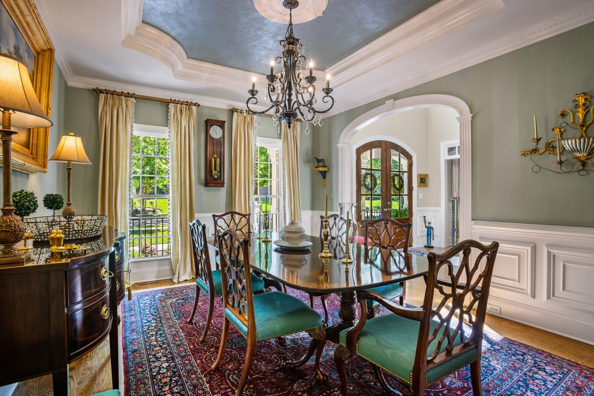 3223 Rain Forrest Way Raleigh, NC 27614 - Photo 12 of 71 a view of a dining room with furniture wooden floor and chandelier