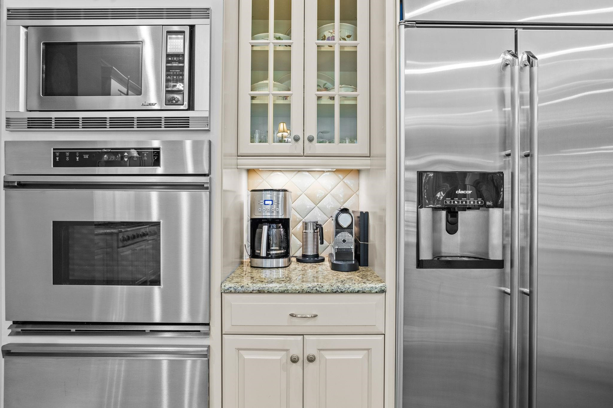 3223 Rain Forrest Way Raleigh, NC 27614 - Photo 21 of 71 a kitchen with cabinets and stainless steel appliances