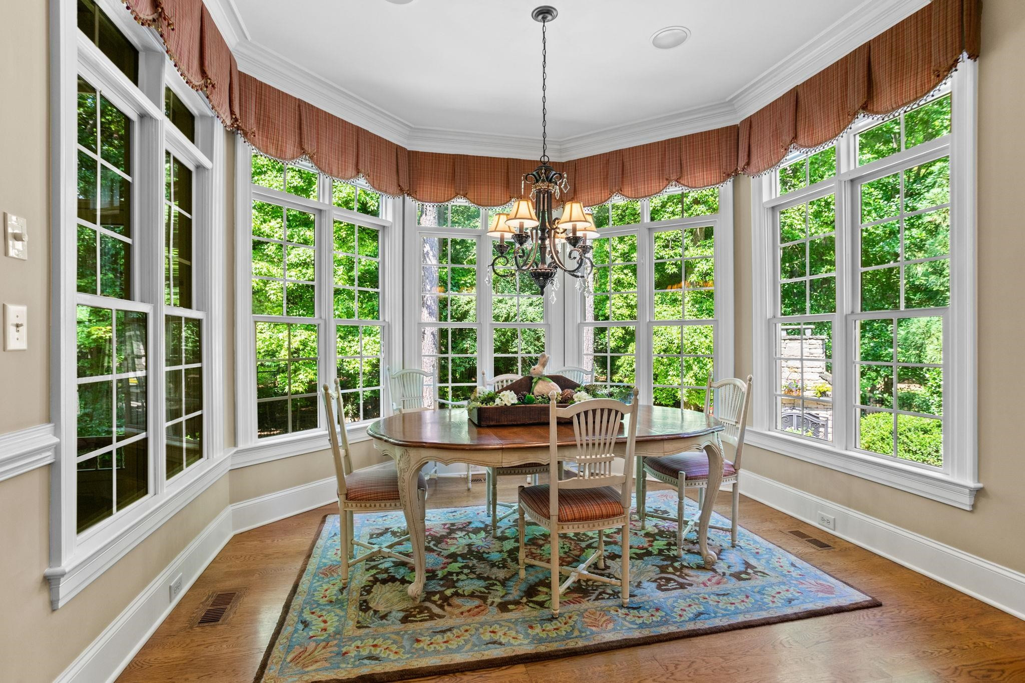 3223 Rain Forrest Way Raleigh, NC 27614 - Photo 22 of 71 a living room with large windows