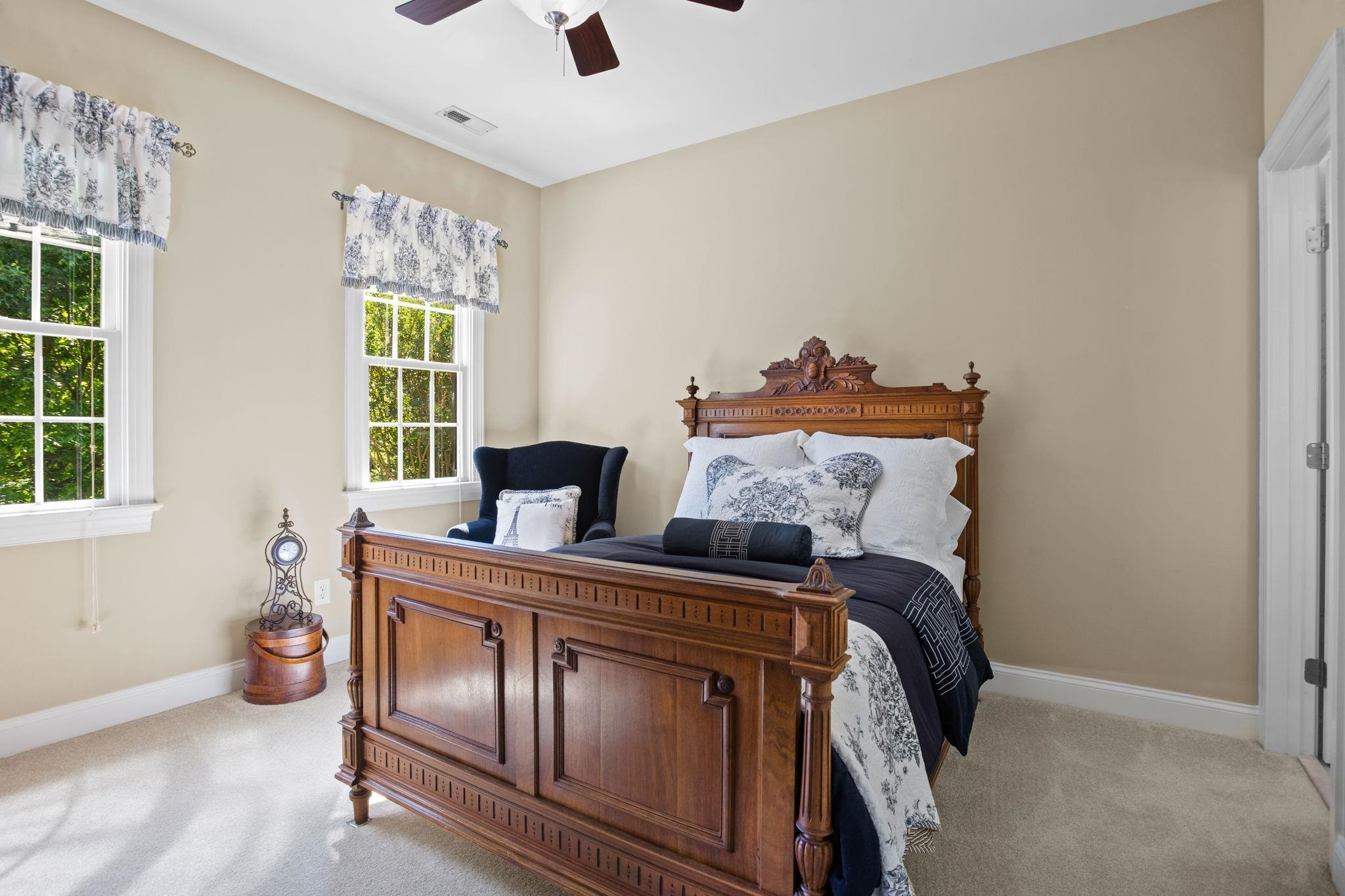 3223 Rain Forrest Way Raleigh, NC 27614 - Photo 30 of 71 a bed sitting in a bedroom next to a window