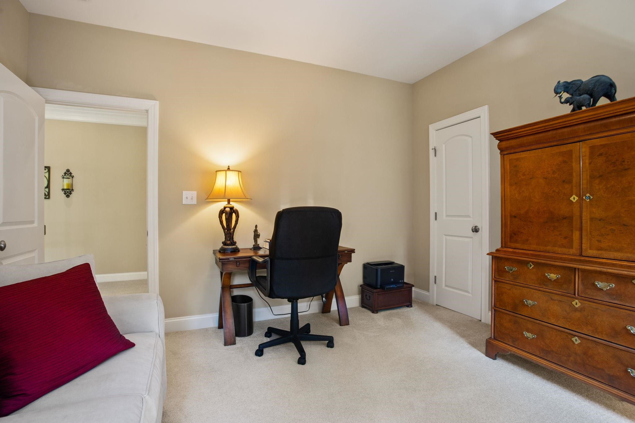 3223 Rain Forrest Way Raleigh, NC 27614 - Photo 38 of 71 a view of a workspace with furniture and a dresser