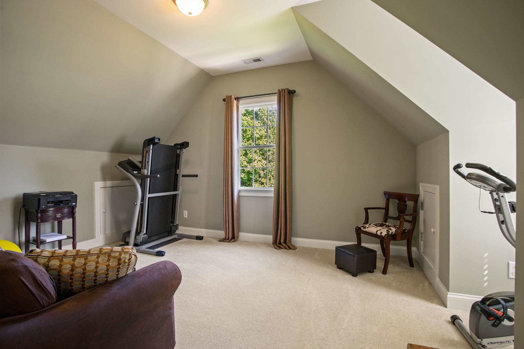 3223 Rain Forrest Way Raleigh, NC 27614 - Photo 42 of 71 a livingroom with furniture and gym equipment