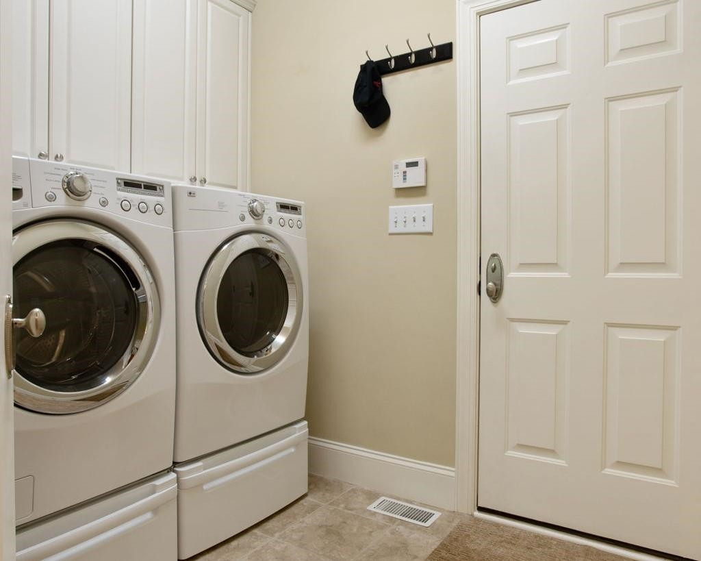 3223 Rain Forrest Way Raleigh, NC 27614 - Photo 45 of 71 a utility room with dryer and washer