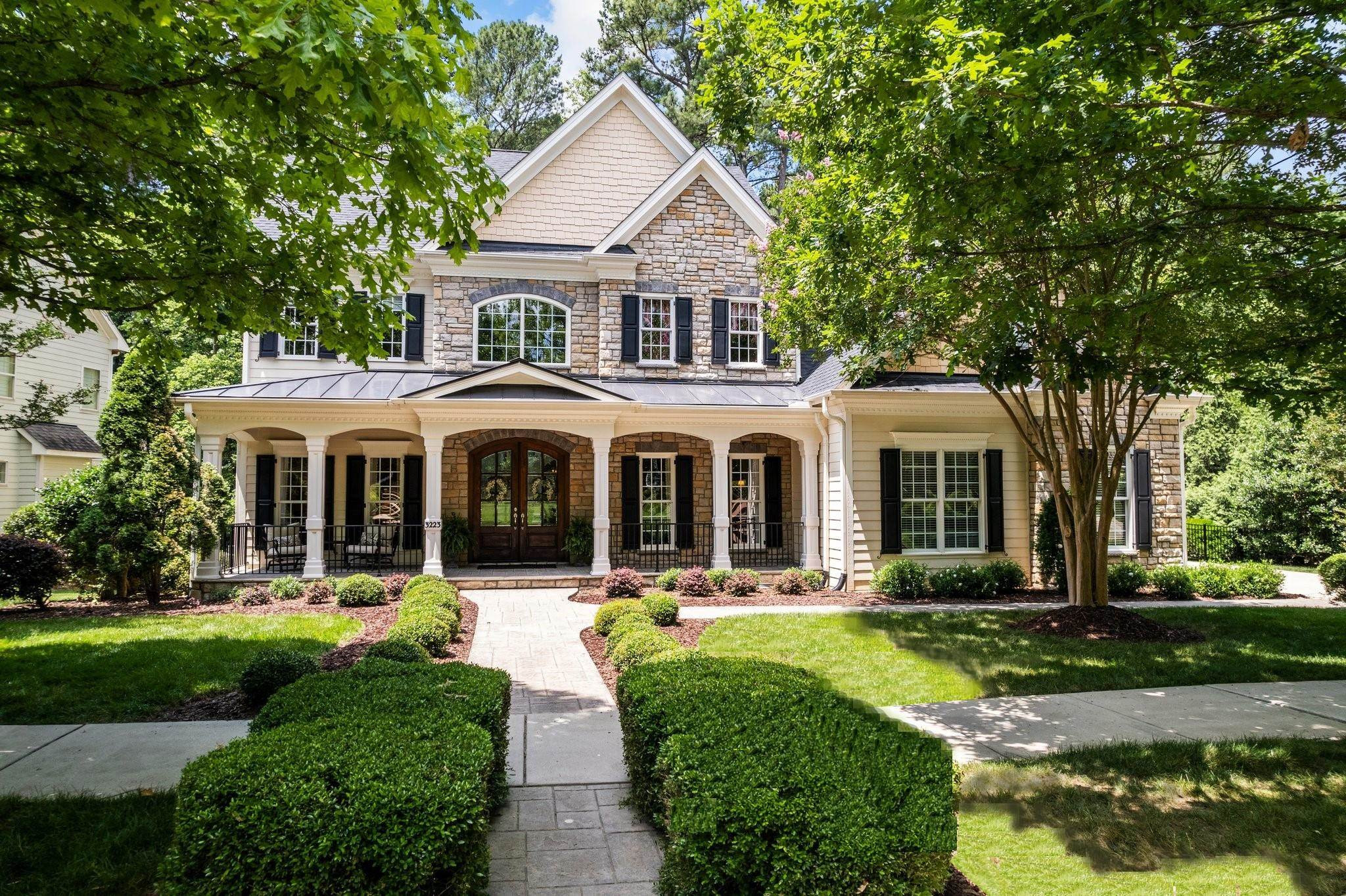 3223 Rain Forrest Way Raleigh, NC 27614 - Photo 52 of 71 a front view of a house with yard and green space