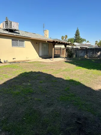a view of a lake with a big yard