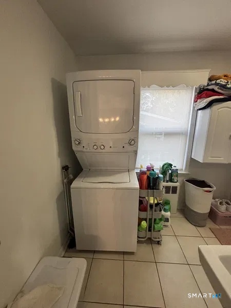 107 Richfield Road Bridgeport, CT 06606 - Photo 14 of 24 a utility room with dryer and washer