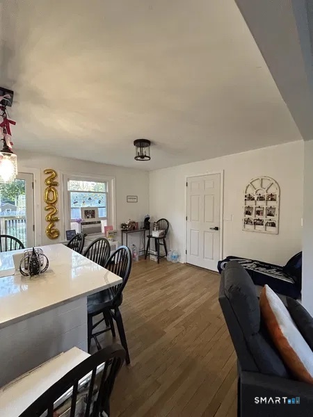 107 Richfield Road Bridgeport, CT 06606 - Photo 3 of 24 a view of a dining room with furniture and window
