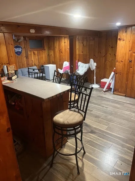 107 Richfield Road Bridgeport, CT 06606 - Photo 9 of 24 a view of a dining room with furniture window and outside view