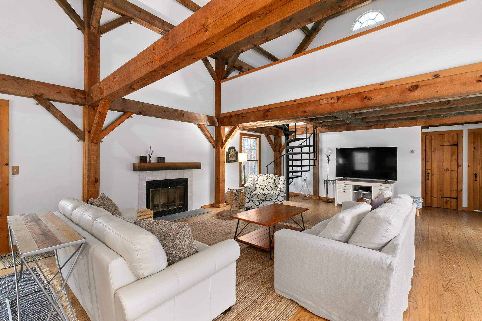 11 Ridge Road East Hampton, NY 11937 - Photo 2 of 19 a living room with furniture and a fireplace