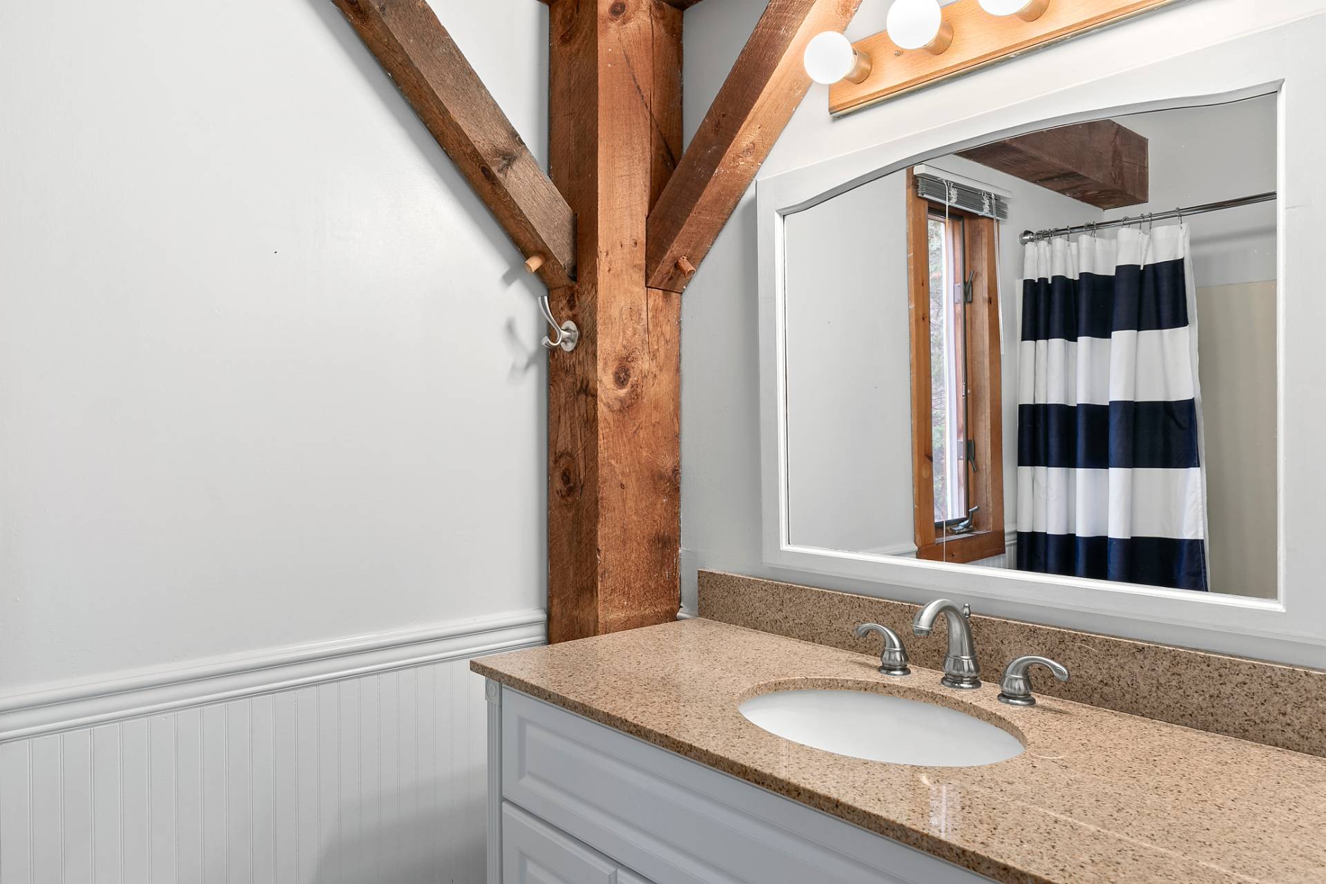 11 Ridge Road East Hampton, NY 11937 - Photo 8 of 19 a bathroom with a granite countertop sink and a mirror