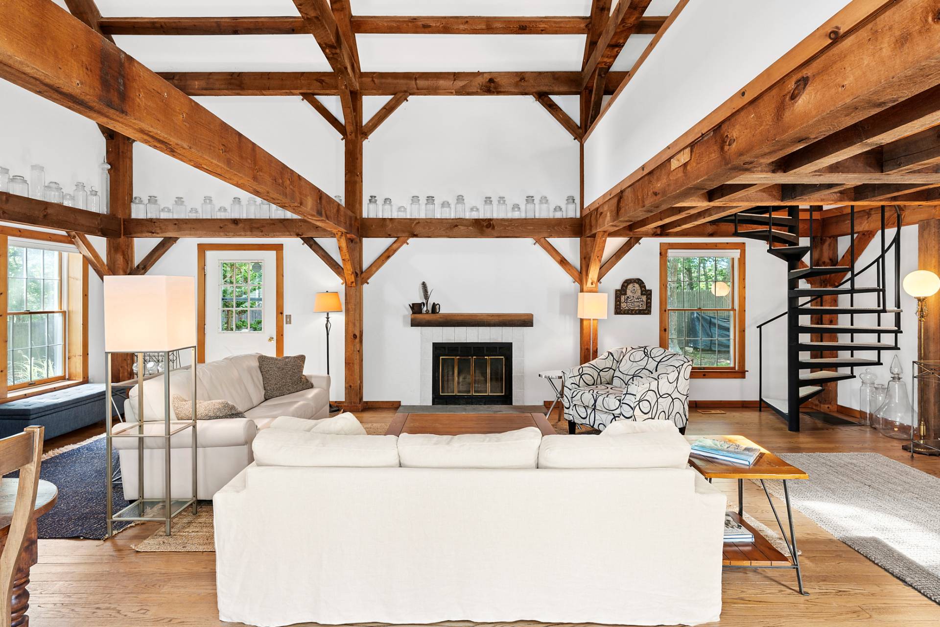 11 Ridge Road East Hampton, NY 11937 - Photo 10 of 19 a living room with furniture a fireplace and next to a window