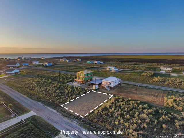 a view of a terrace with wooden floor and a city view