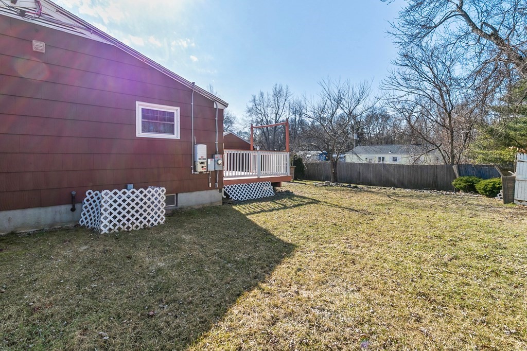 90 Newhouse Street Springfield, MA 01118 - Photo 28 of 36 a view of a backyard with a garden