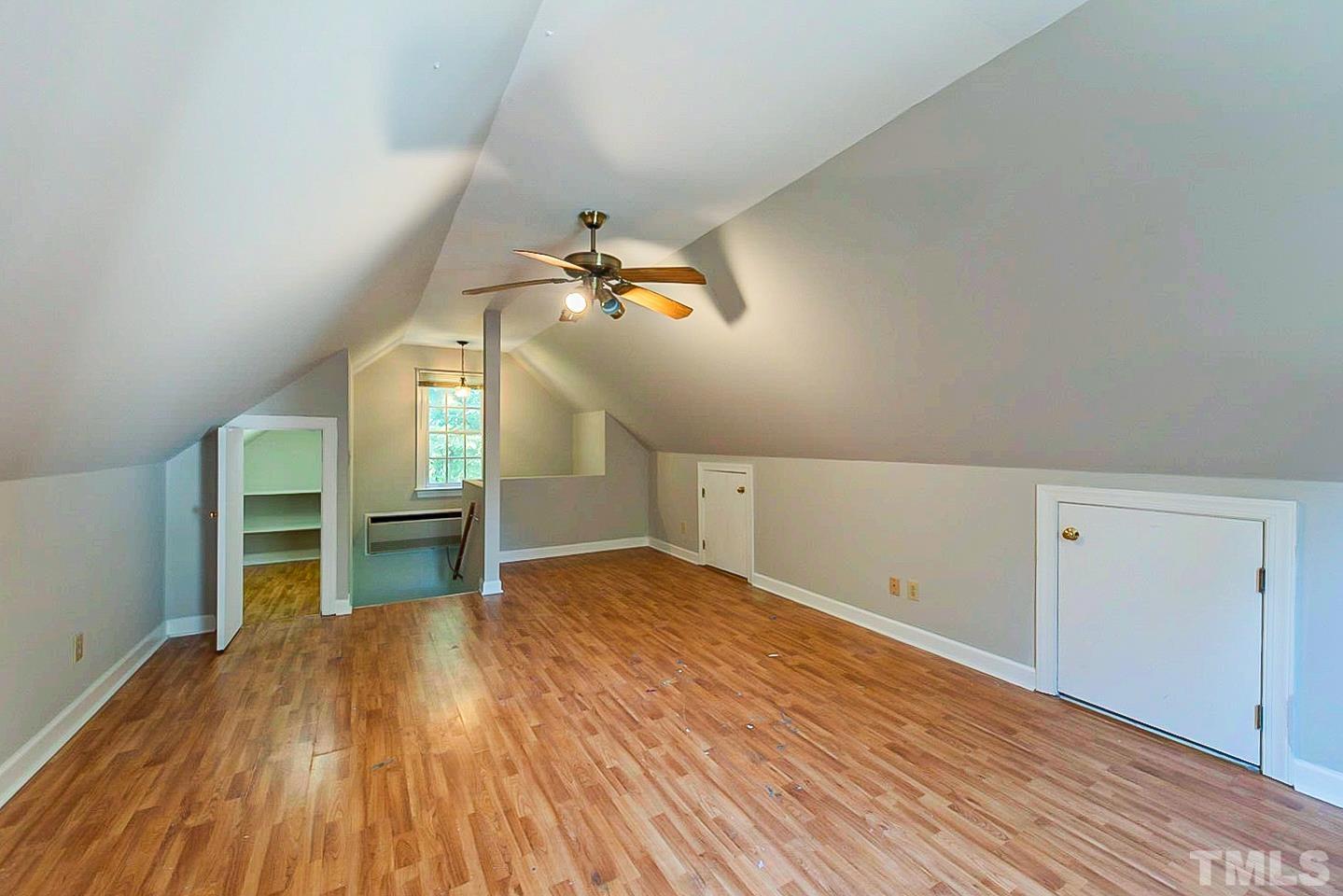 4714 Highgate Drive Durham, NC 27713 - Photo 17 of 22 wooden floor in an empty room with a window
