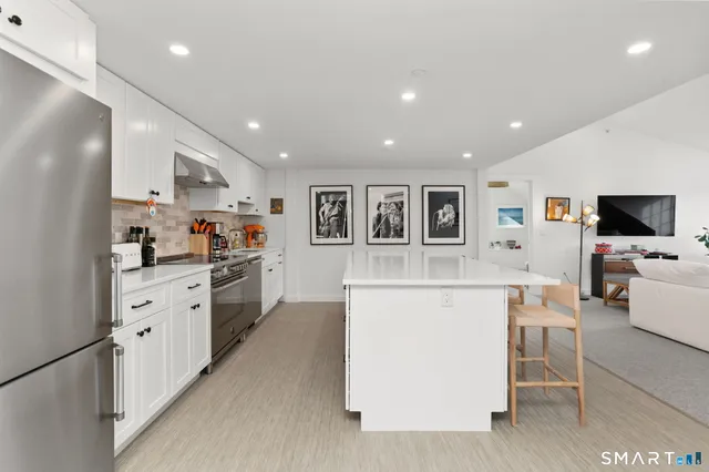 a kitchen with cabinets and counter space