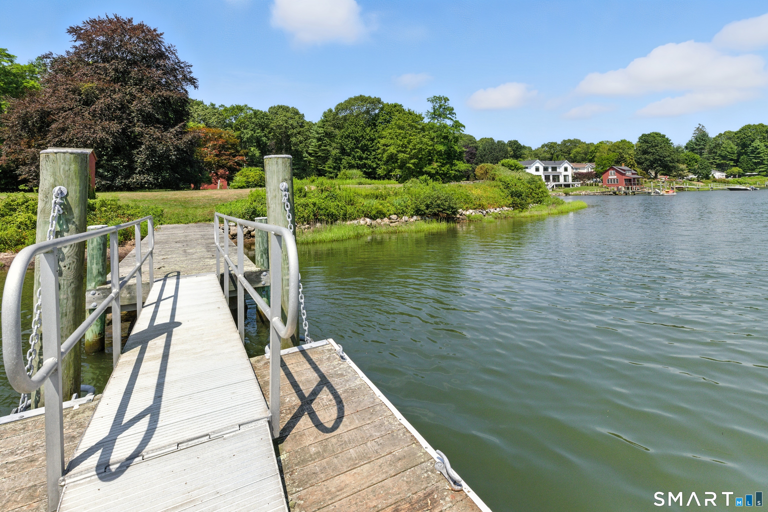 88 Cove Road Stonington, CT 06378 - Photo 24 of 27 a view of a lake with a large mountain