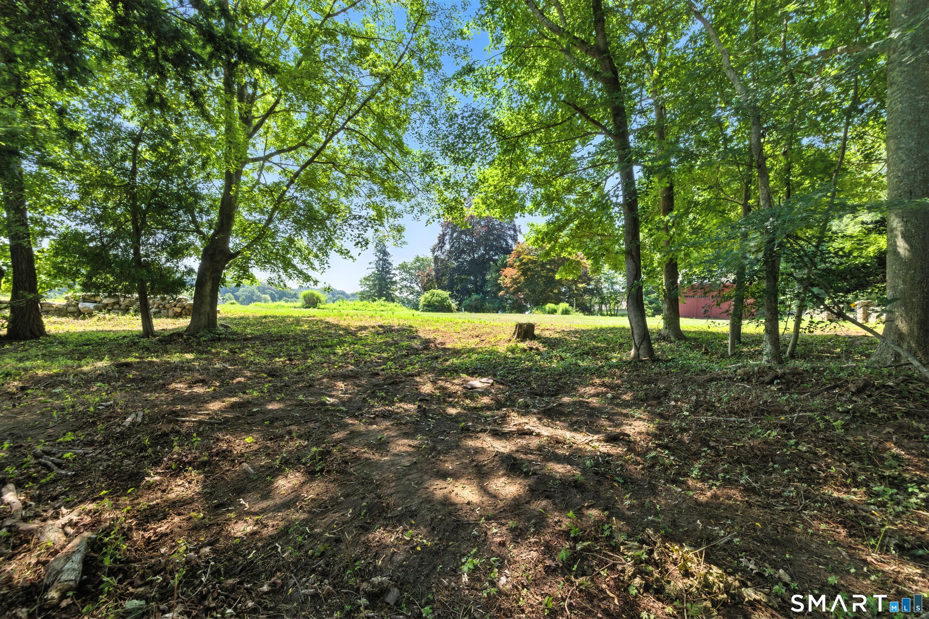88 Cove Road Stonington, CT 06378 - Photo 7 of 27 a view of outdoor space with trees all around