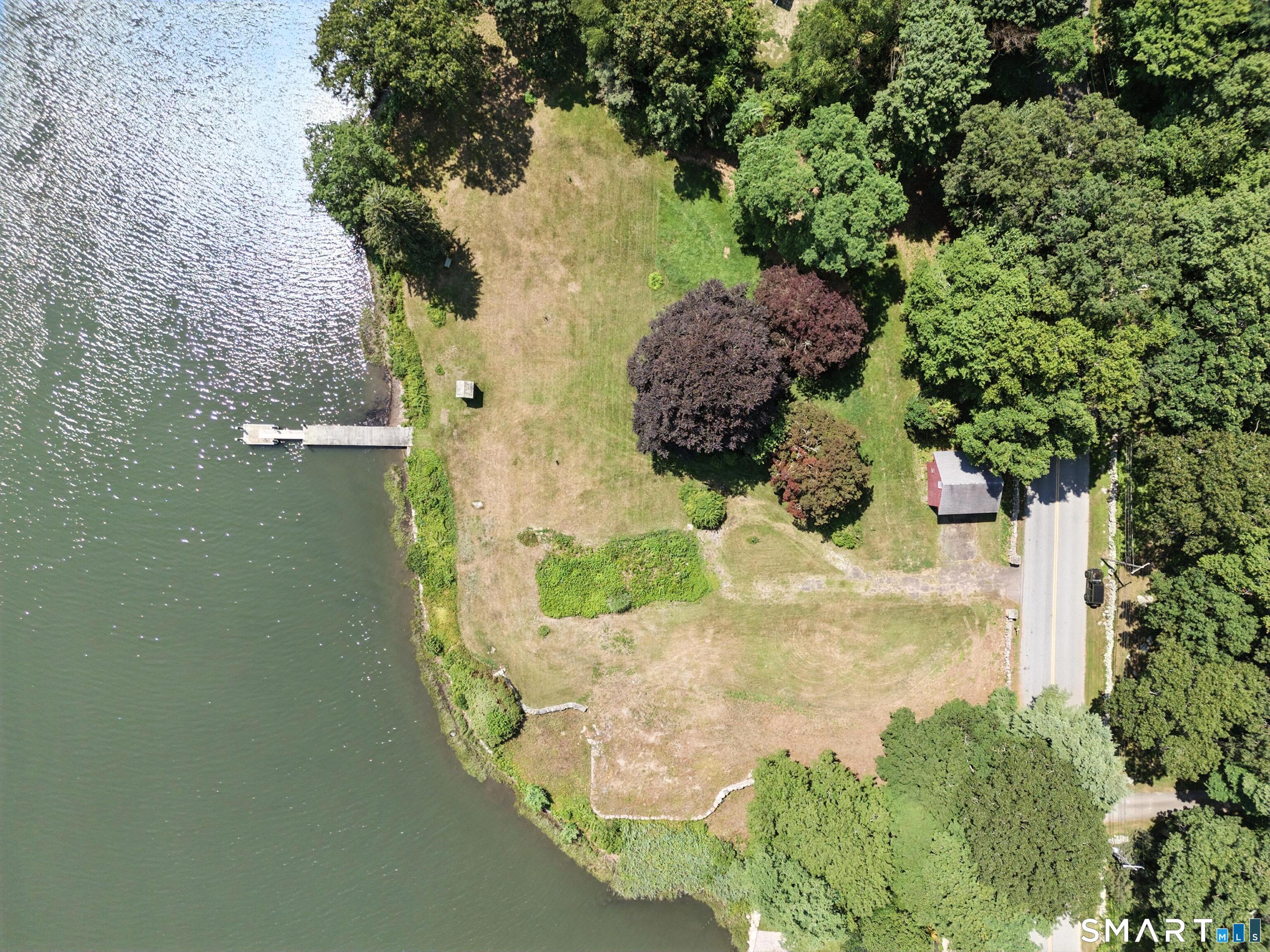 88 Cove Road Stonington, CT 06378 - Photo 9 of 27 a view of a garden