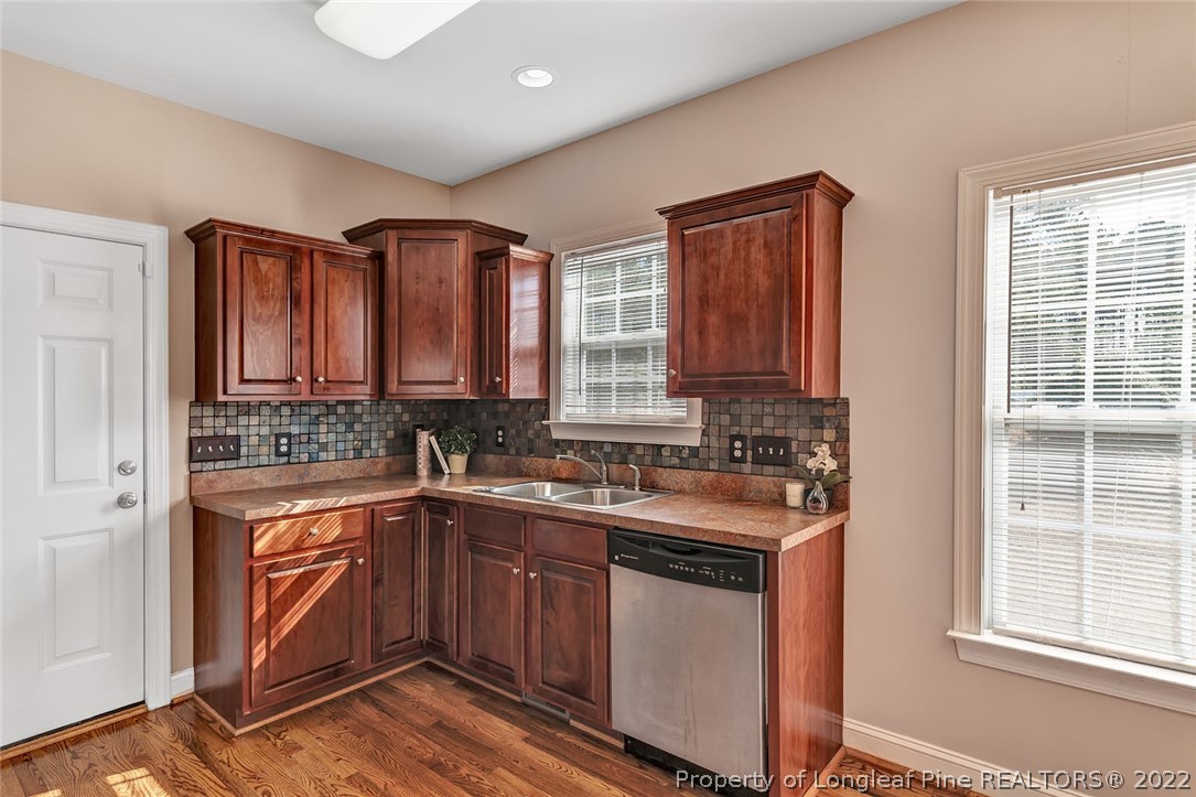 31 Reece Drive Sanford, NC 27332 - Photo 14 of 36 a kitchen with a sink stove and cabinets