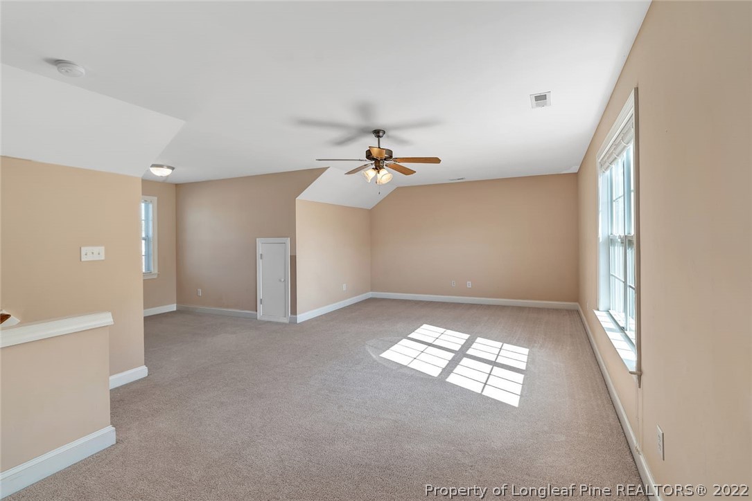 31 Reece Drive Sanford, NC 27332 - Photo 18 of 36 a view of an empty room and a window