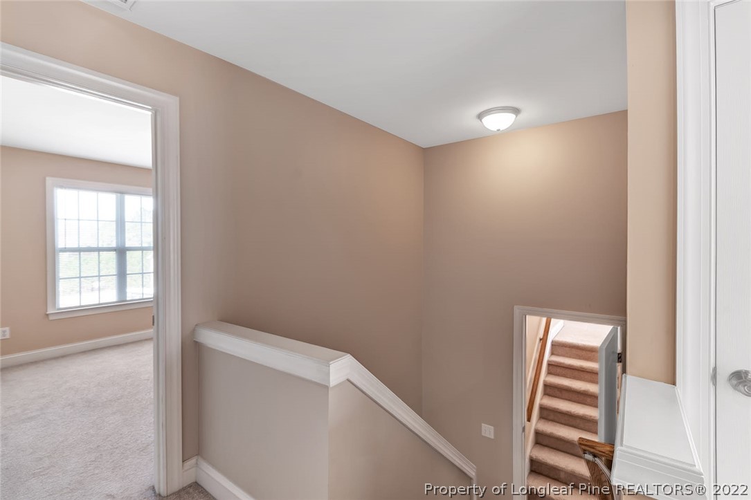 31 Reece Drive Sanford, NC 27332 - Photo 20 of 36 a view of room with stairs and wooden floor