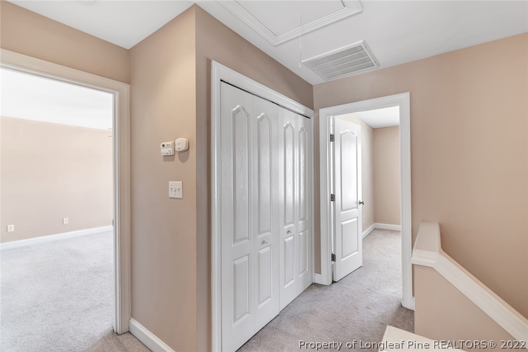 31 Reece Drive Sanford, NC 27332 - Photo 27 of 36 a view of a bathroom with a glass door shower