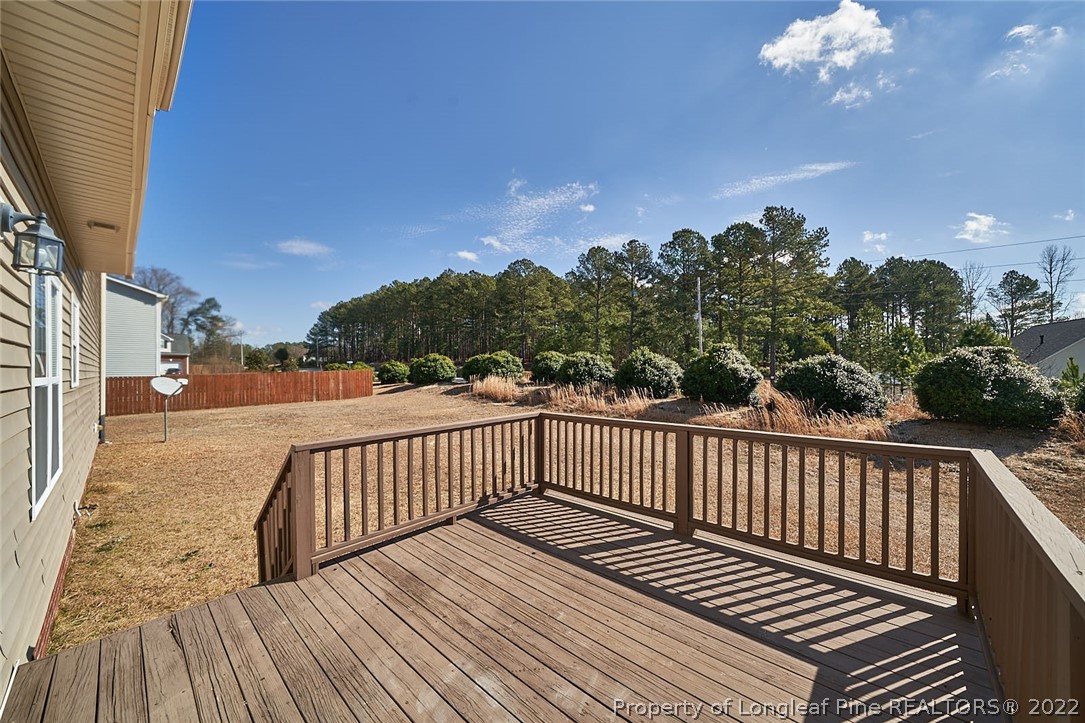 31 Reece Drive Sanford, NC 27332 - Photo 35 of 36 a view of a balcony with wooden floor